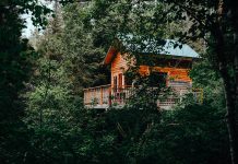 What Are the Best Family Camping Locations in Canada? Canopée Lit - 4 person Eau Frette cabin.