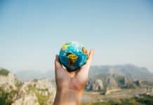 What Travel Teaches You That Nothing Else Can Travel the world - Globe in the hands. pexels-nurseryart-346885