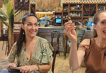 Discover Seville’s Culinary Heart Through Tapas Eating Tapas in Seville, Spain.