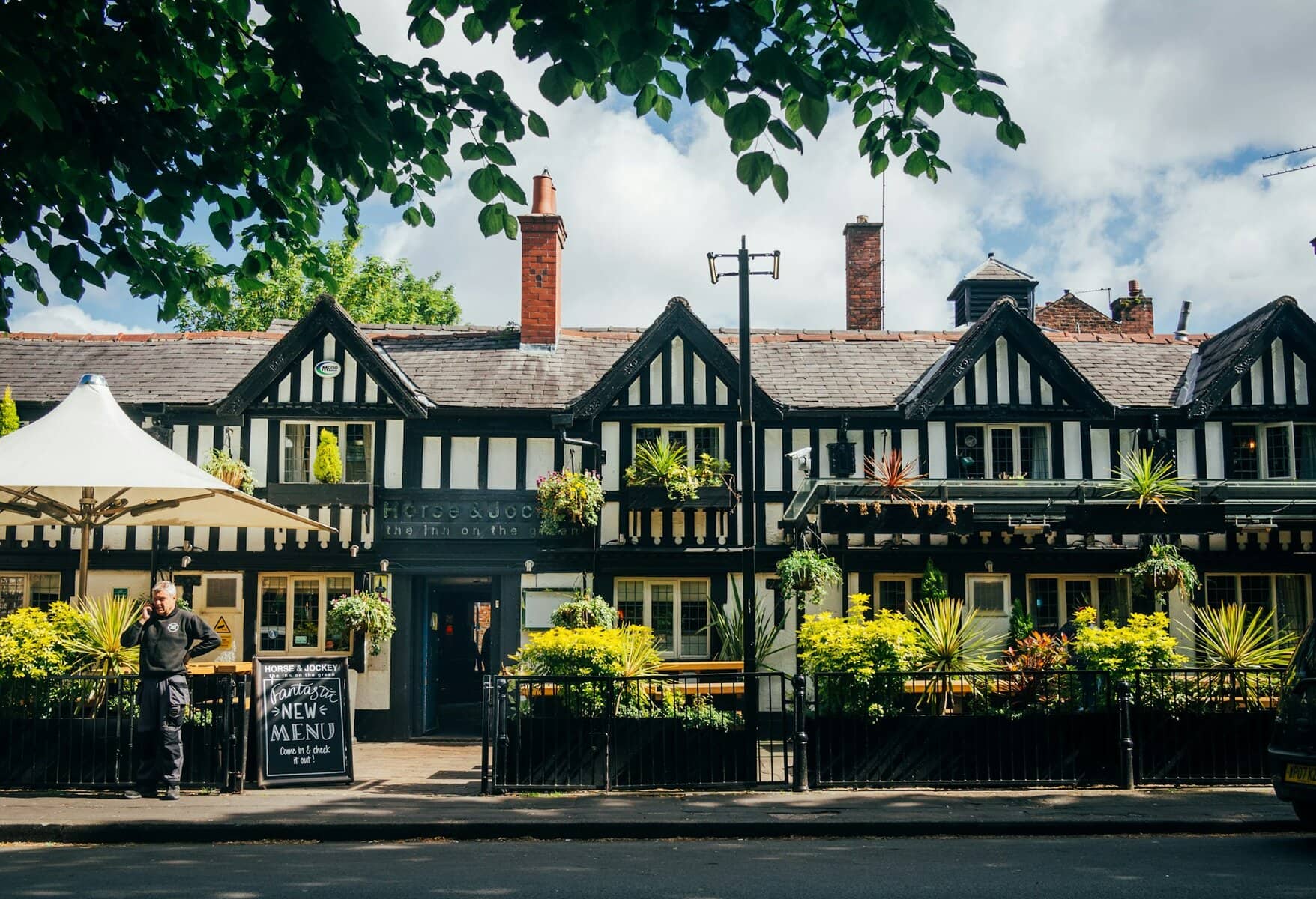- Best Travel Hacks That Will Actually Save You Money in Manchester Horse & Jockey in Chorlton, Manchester, UK. greg-willson -unsplash.