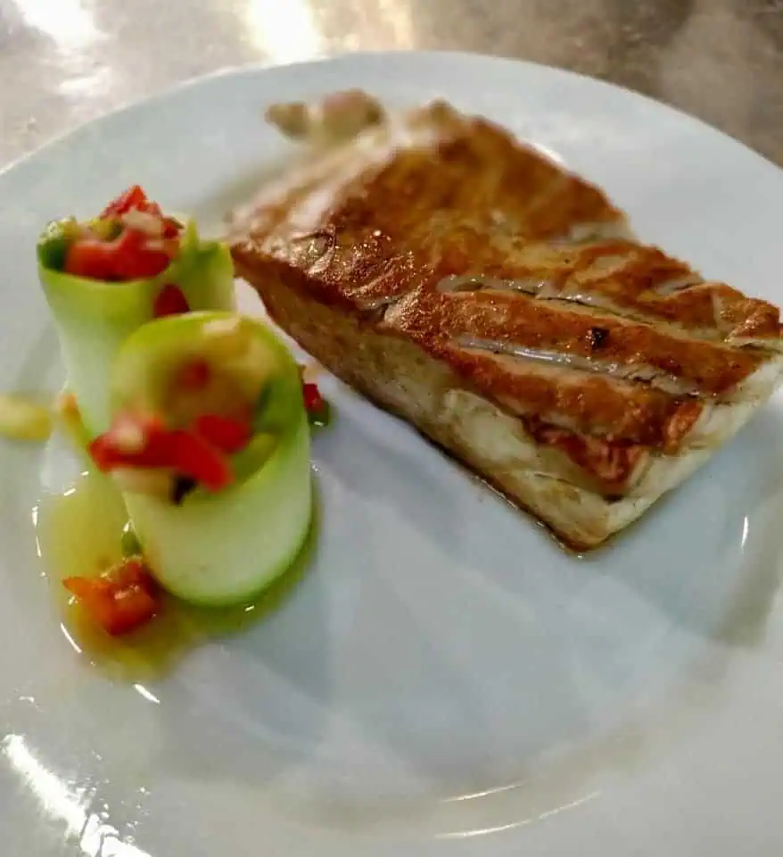 - Discover Seville’s Culinary Heart Through Tapas Tuna belly with zucchini rolls, a light dish that's full of flavor at El Atun in Seville, Spain.