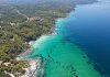 Hiking Trails in Northern Greece: A Story of Gods, Gorges, and Goats A view from above at the majestic beach of Kavourotrypes, located in Sithonia, Halkidiki, Greece