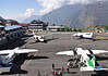 Everest Panorama Trek vs Everest Base Camp: A Practical Comparison Planes at the Tenzing Hillary Airport in Lukla, Nepal.