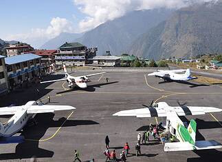 Everest Panorama Trek vs Everest Base Camp: A Practical Comparison Planes at the Tenzing Hillary Airport in Lukla, Nepal.