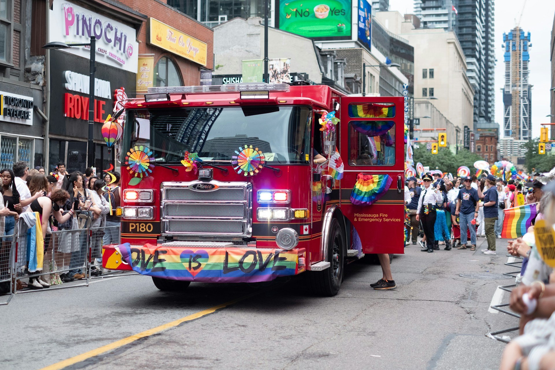 Firefighter decorated at Toronto Pride, Canada. Pic by samantha-hare -unsplash.
