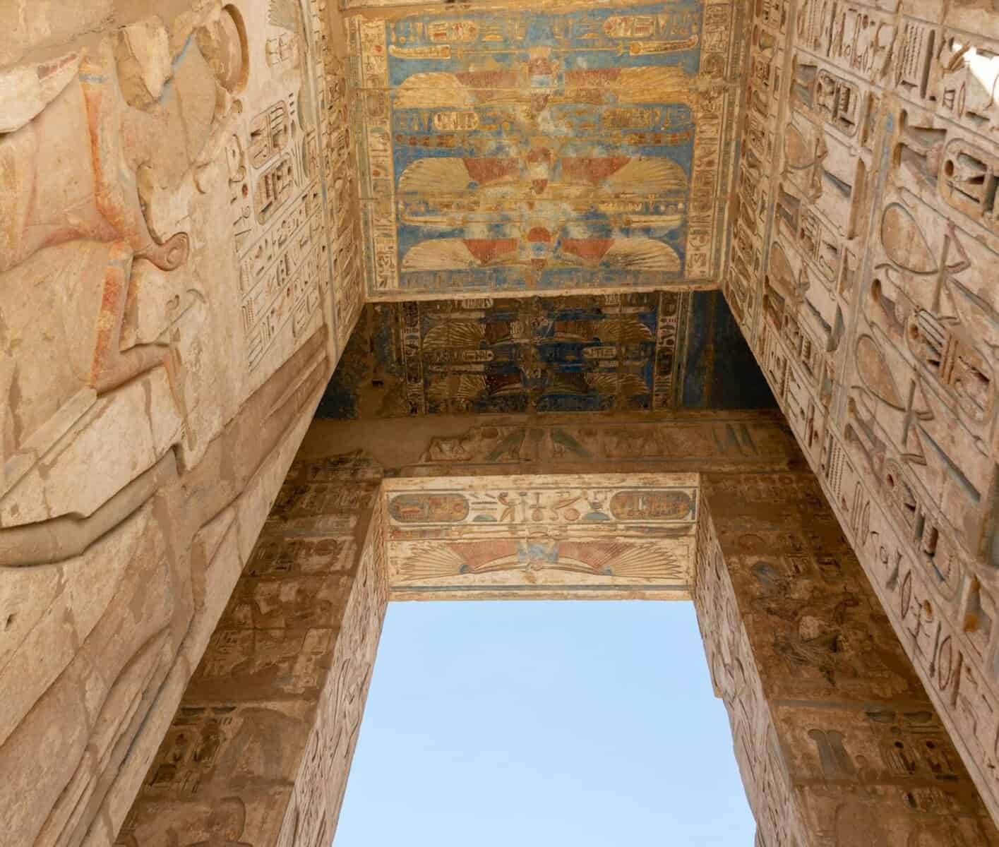 multi-day luxor and aswan trip - Multi-Day Luxor and Aswan Trip: An Unforgettable Nile Cruise Through Ancient Egypt Gaint door covered in Hieroglyphs Medinet Habu, Luxor, Egypt