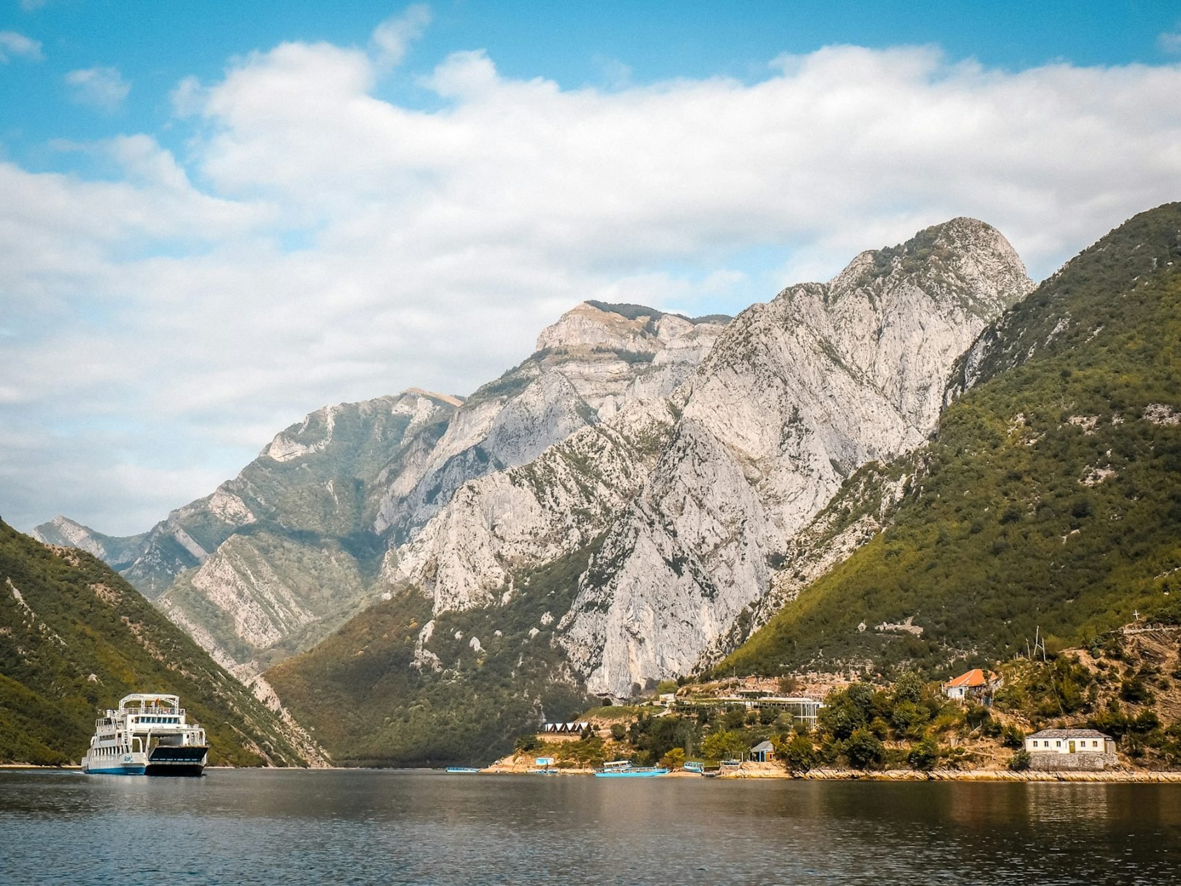- The Best Off-Season Holiday Destinations: When to Visit for Fewer Crowds and Better Value Komani Lake in Albania. Pic by Adventure Albania -unsplash.