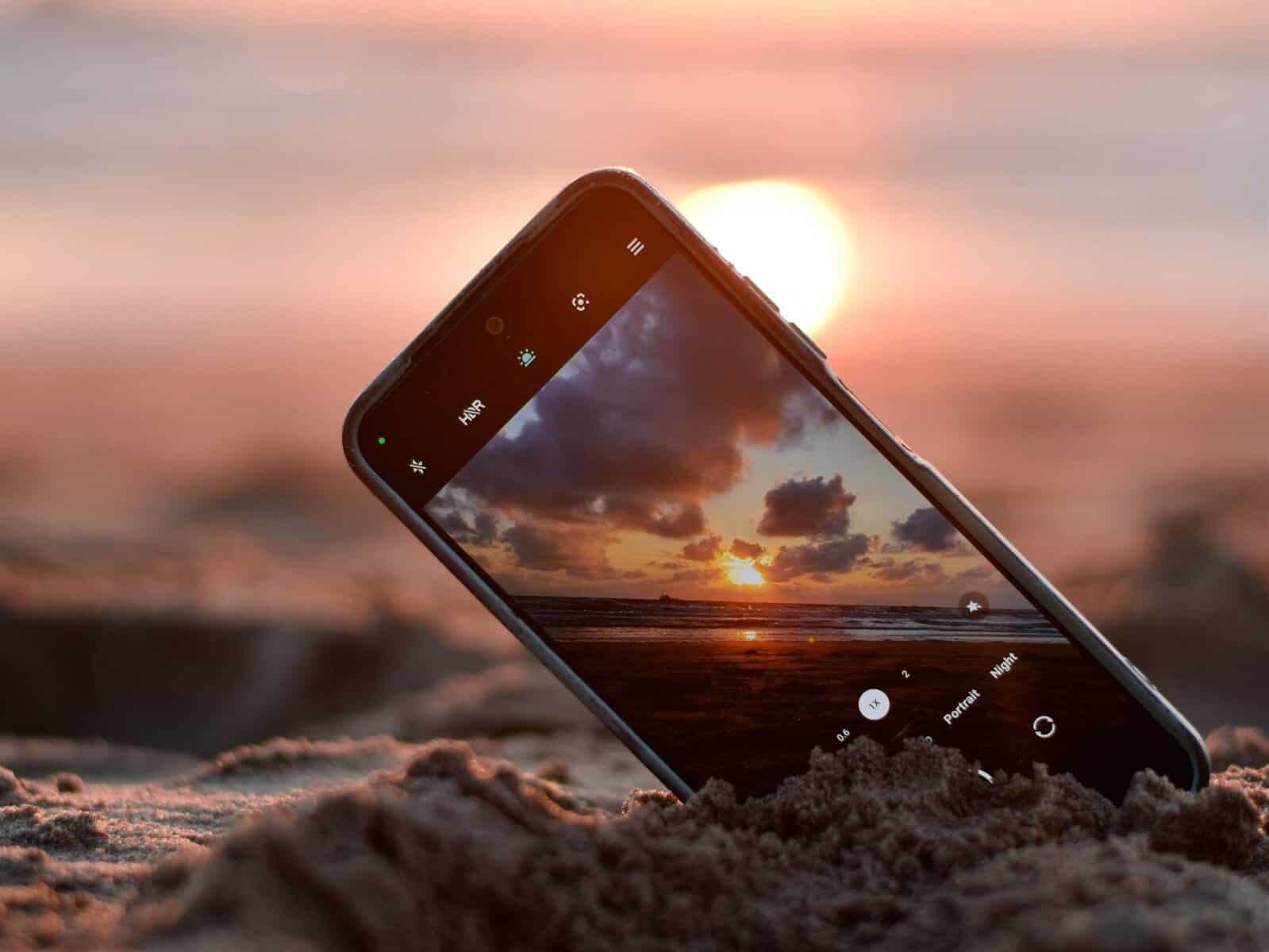 Taking a sunset photo at the beach.