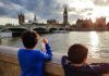 How to Spend a Weekend in London with Kids Boys looking over the thames at big ben and london bridge