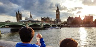 How to Spend a Weekend in London with Kids Boys looking over the thames at big ben and london bridge