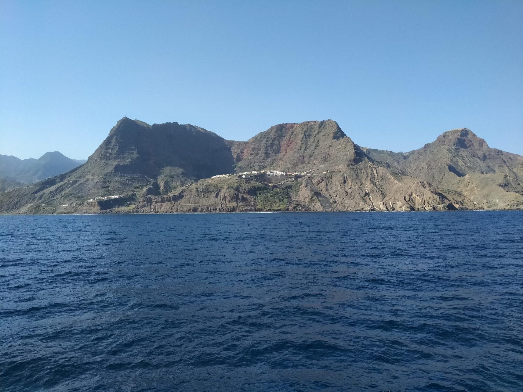 - Tenerife Day Trip to La Gomera: Island-Hopping to the Whistling Isle Approaching La Gomera by ferry.