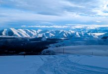 Winter in the French Pyrenees: Powder, Thermal Baths and Authentic Mountain Vibes At the top of Pla d'Adet in the French Pyrenees.