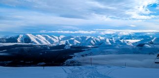 Winter in the French Pyrenees: Powder, Thermal Baths and Authentic Mountain Vibes At the top of Pla d'Adet in the French Pyrenees.