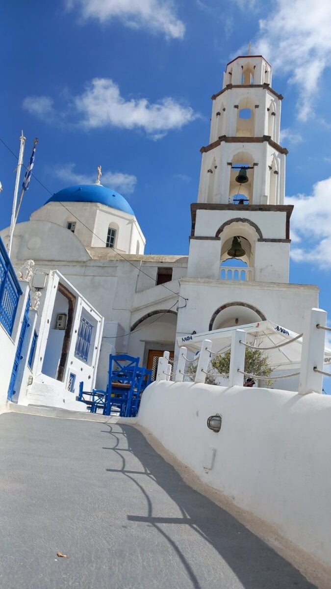 Medieval Santorini Villages - Medieval Santorini Villages: Where the Island Finally Slows Down Medieval villages in Santorini featuring Pyrgos bell tower and cobbled streets