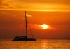 Corporate Events and Team Building on Mallorca Yachts Catamaran in Mallorca at sunset.