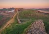 Where the Roman Empire Ends: Walking Hadrian’s Wall’s Wildest Section Hadrian's Wall, Brampton, UK. Wall snaking across crags. Pic via jonny-gios -unsplash