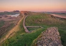 Where the Roman Empire Ends: Walking Hadrian’s Wall’s Wildest Section Hadrian's Wall, Brampton, UK. Wall snaking across crags. Pic via jonny-gios -unsplash