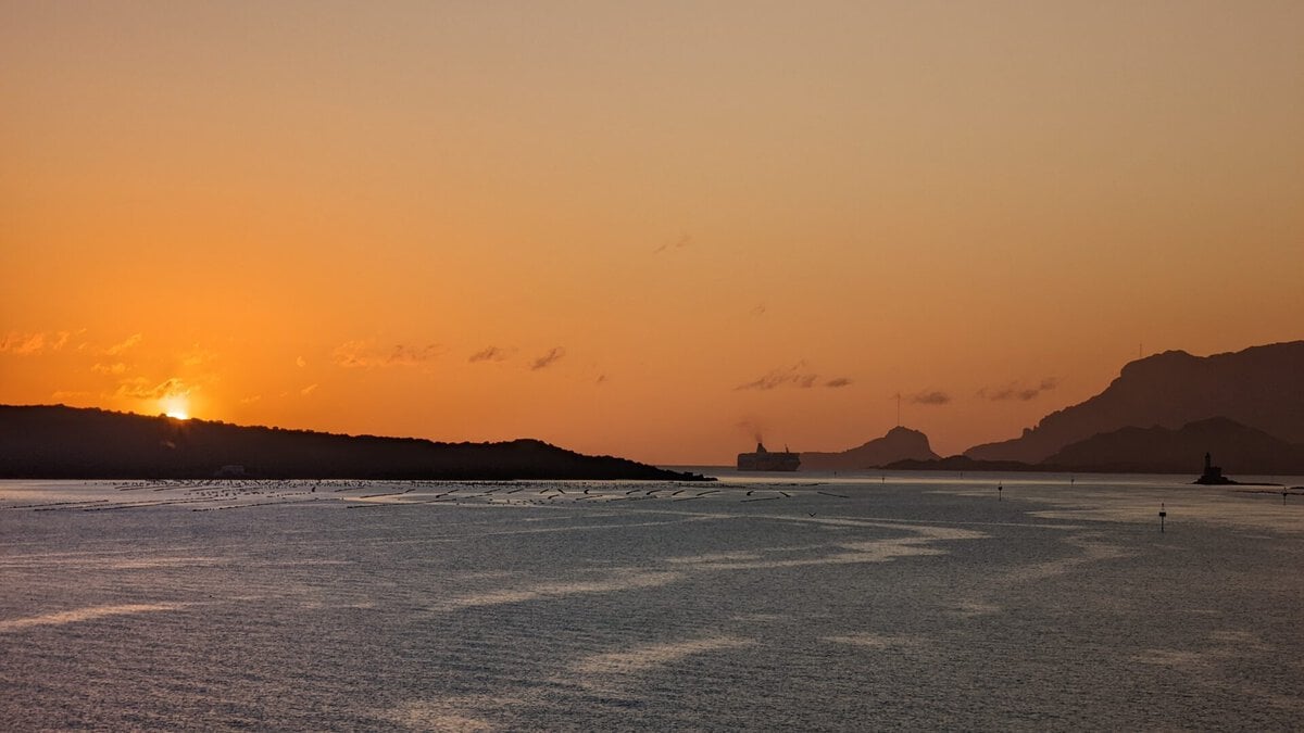 Sunrise while arriving in Olbia, Italy.