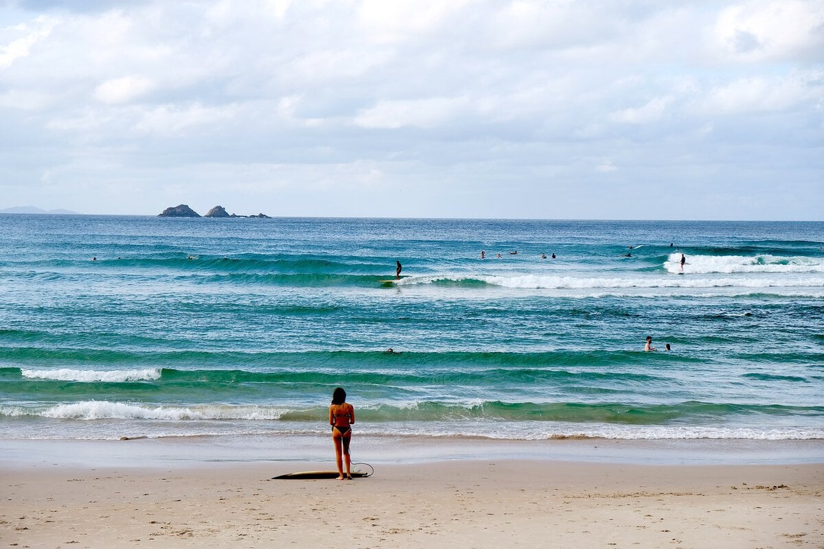 Surfing at Watego beach in Byron Bay, Australia.